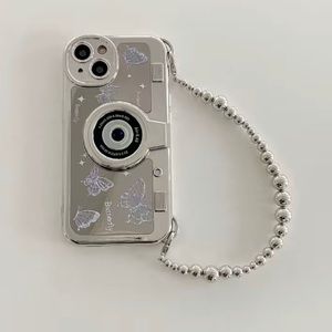 Camera case iPhone 13 Pro Max with wrist strap silver.